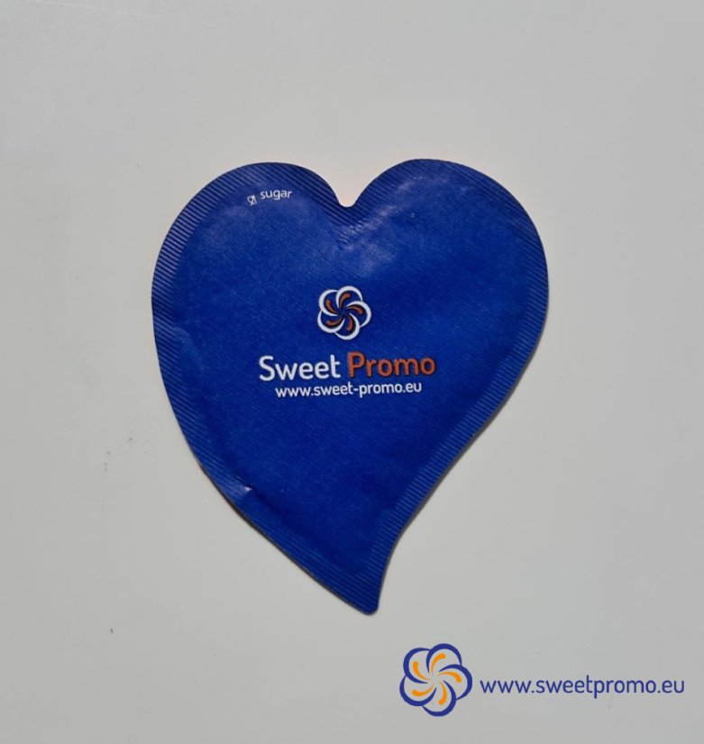 Blue heart-shaped promotional sugar with your own print. Originally packaged sugar for coffee and tea, suitable for hotels, restaurants, corporate events and catering, trade fairs and conferences.