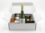 Care Christmas gift box with Spanish sparkling wine Care Brut 0.75 l, dried sausage Fuet Extra and other delicacies. The package is packed in a gift box with the option of adding a corporate sticker. Suitable as a representative Christmas gift for employees, clients and business partners.