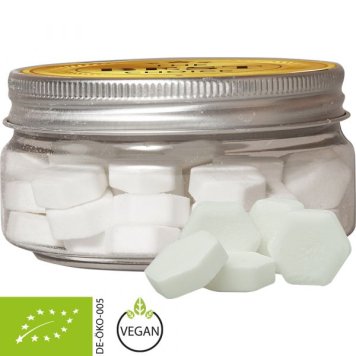 Vegan sweet treat – organic orange grape sugar in a jar with promotional label